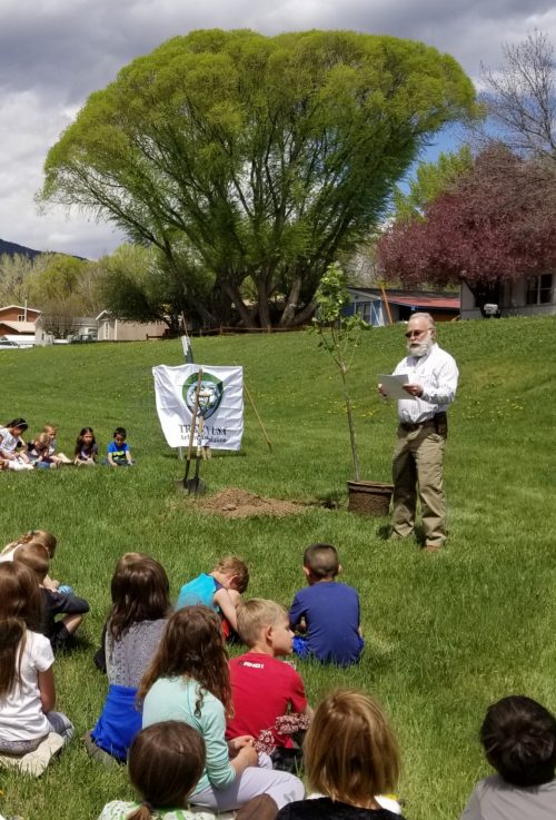 The mayor reading the 2019 Tree City USA proclamation at Arbor Day.